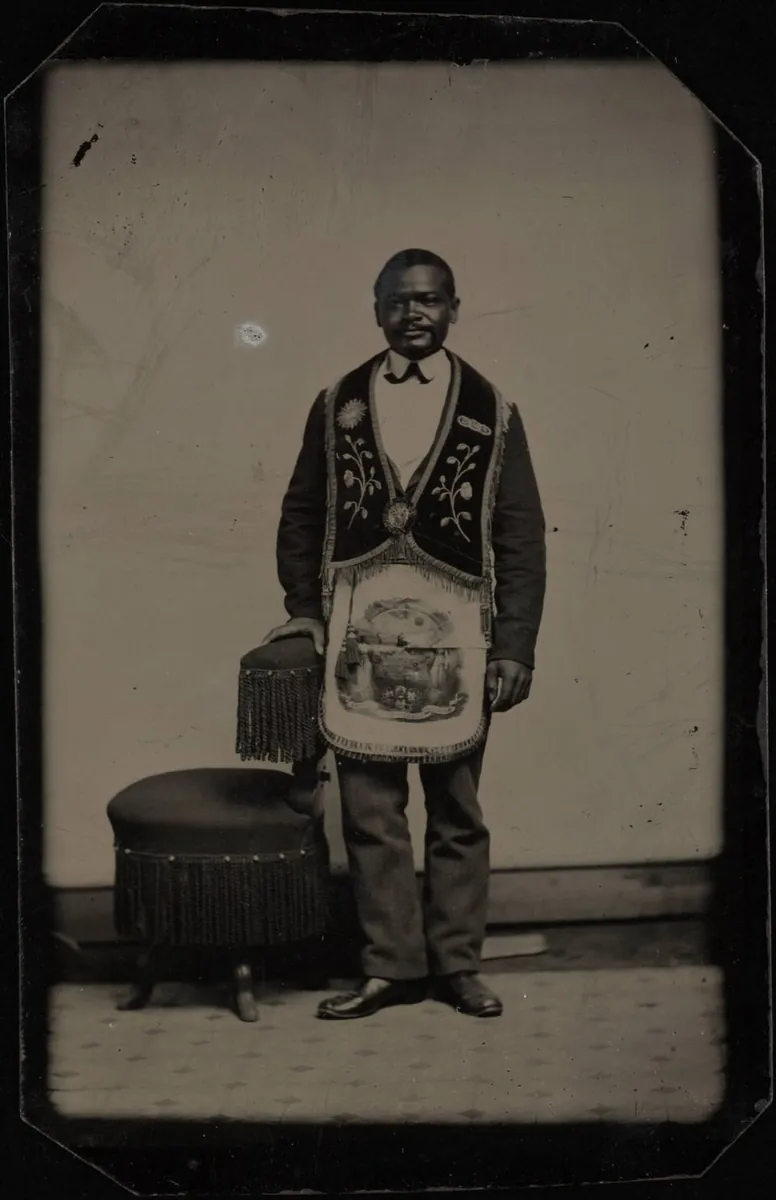 Full length portrait of man in masonic apron. Tintype, cropped all corners, sixth plate