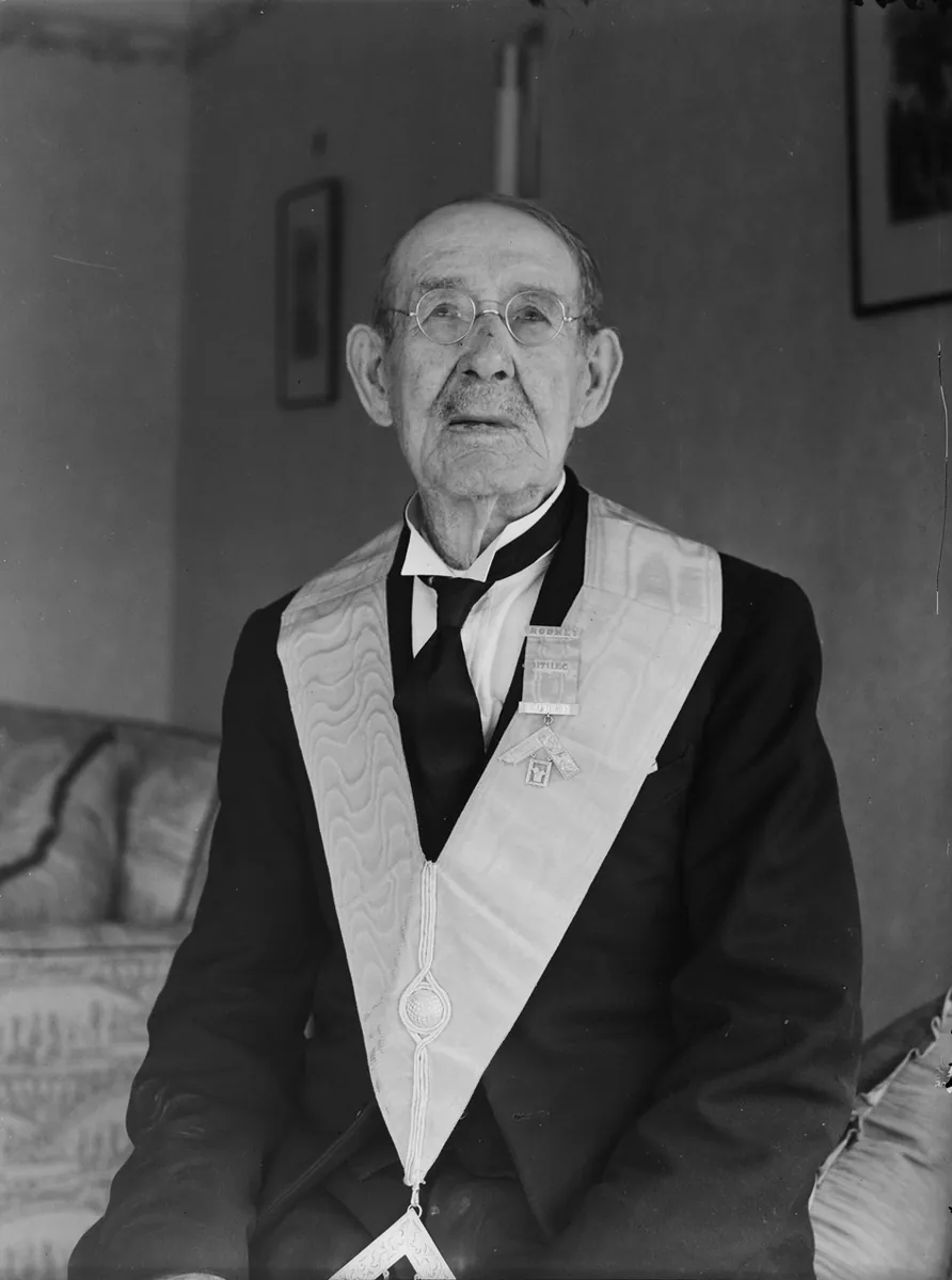 Portrait of an elderly man in freemasons attire with 'Rodney 1711EC Lodge' badge (AM 87006-1)